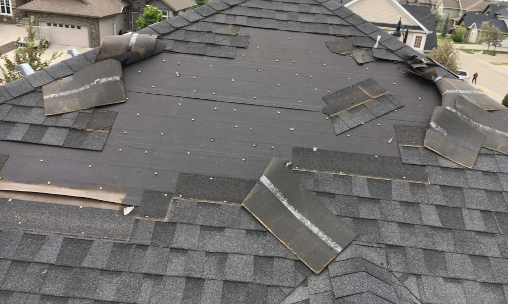 A section of a roof being repaired by ProLine Roofing crew.